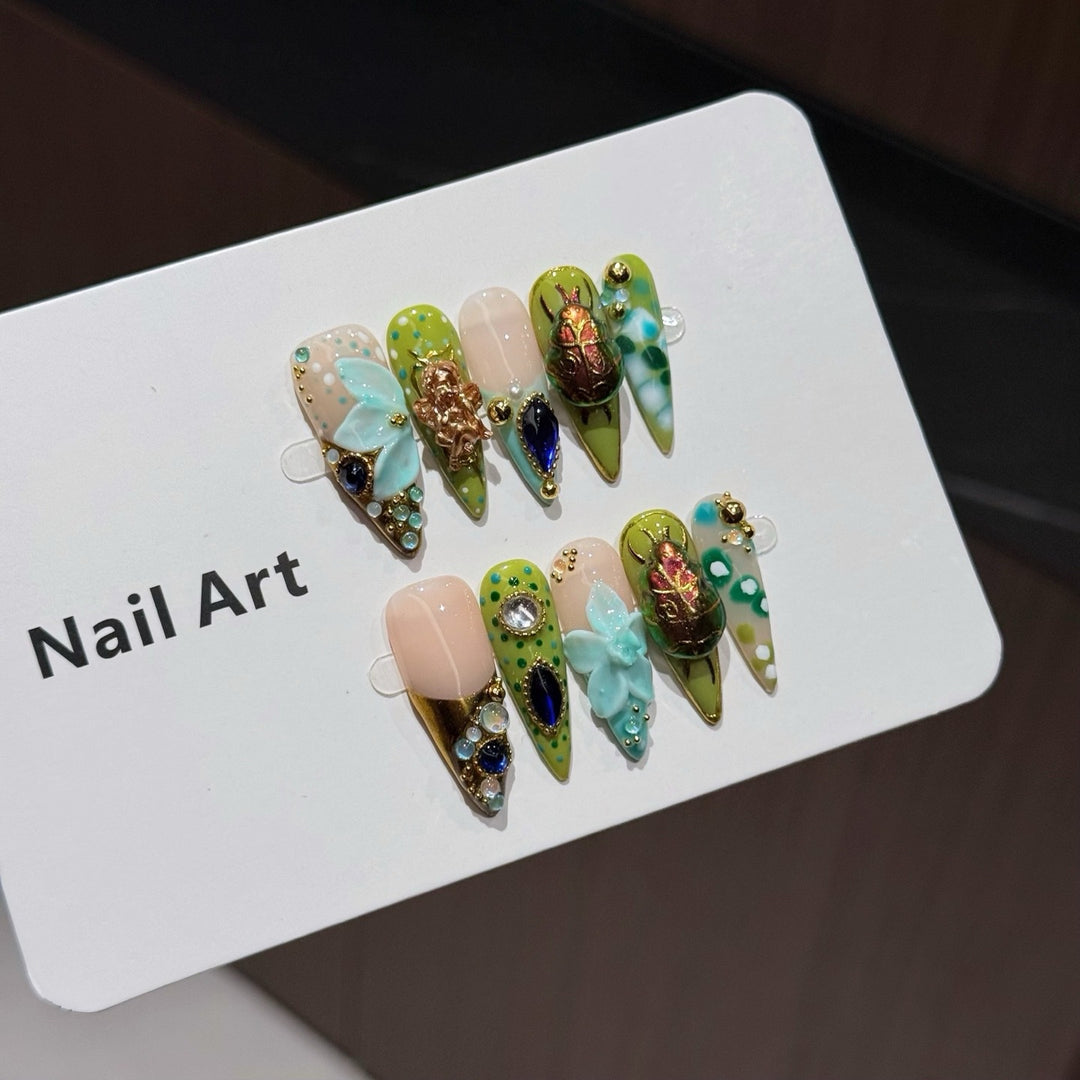 Artistic Nail Art Set with Floral and Gemstone Accents