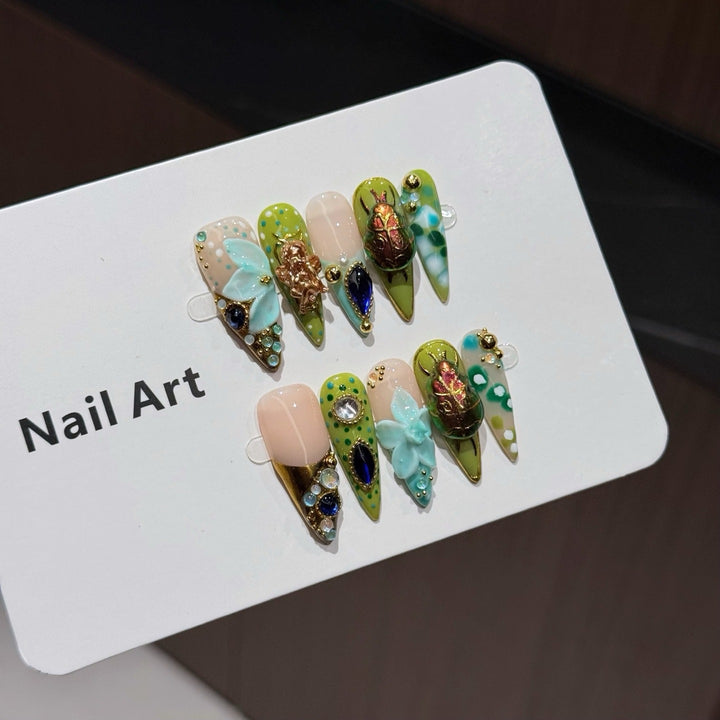 Artistic Nail Art Set with Floral and Gemstone Accents