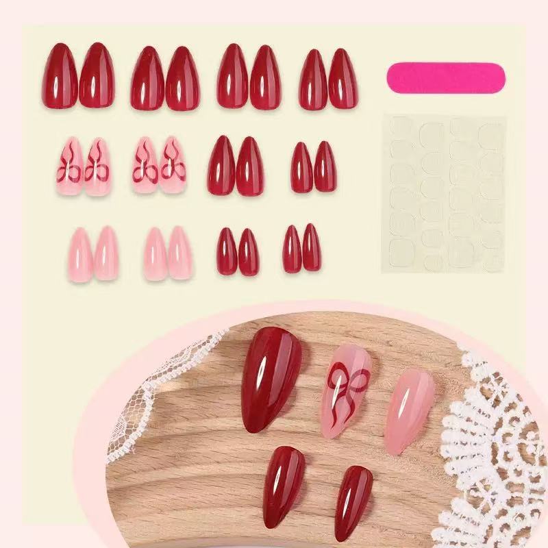 Acrylic nail set with luxurious shine and playful design accents Stornfield