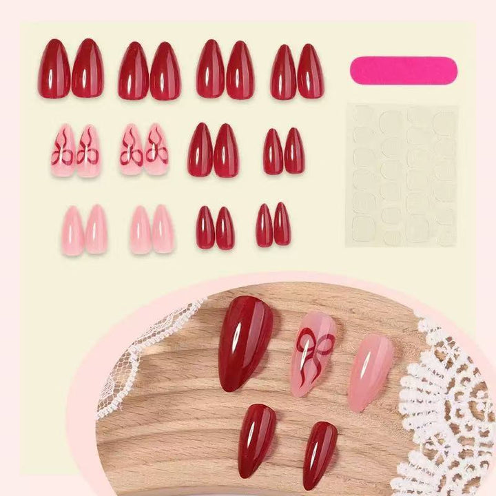 Acrylic nail set with luxurious shine and playful design accents Stornfield