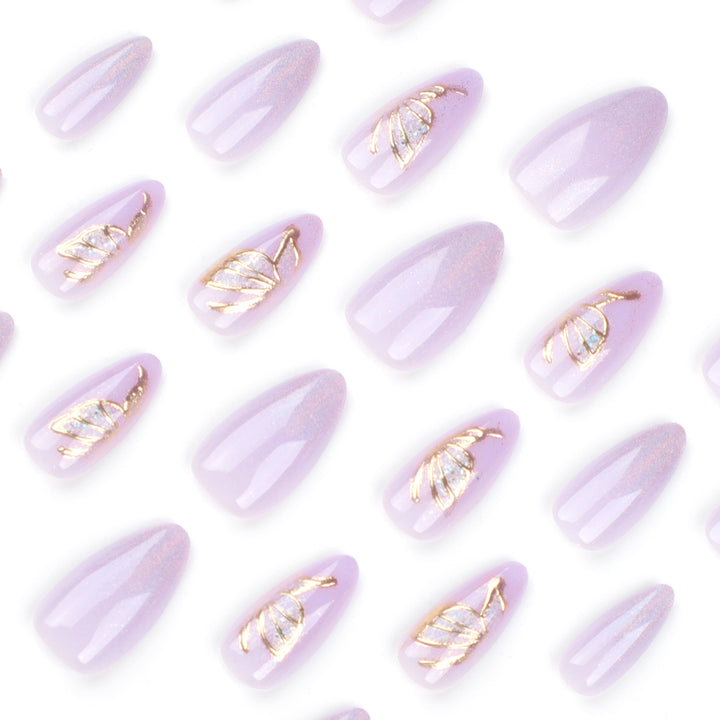 Glamorous artificial nails with rhinestone and glitter decorations Stornfield
