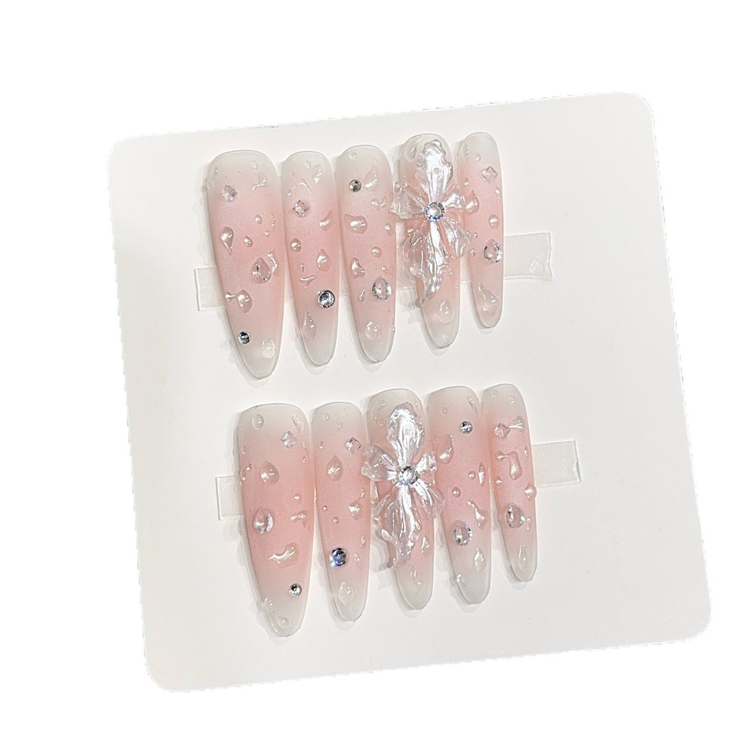 Glamorous artificial nails with sparkling accents Stornfield