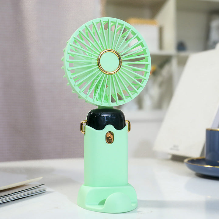Women's Portable Hand Fan with Integrated Spray Function and USB Charging Option Stornfield