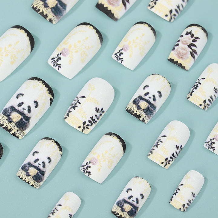Artificial nails with floral panda design Stornfield