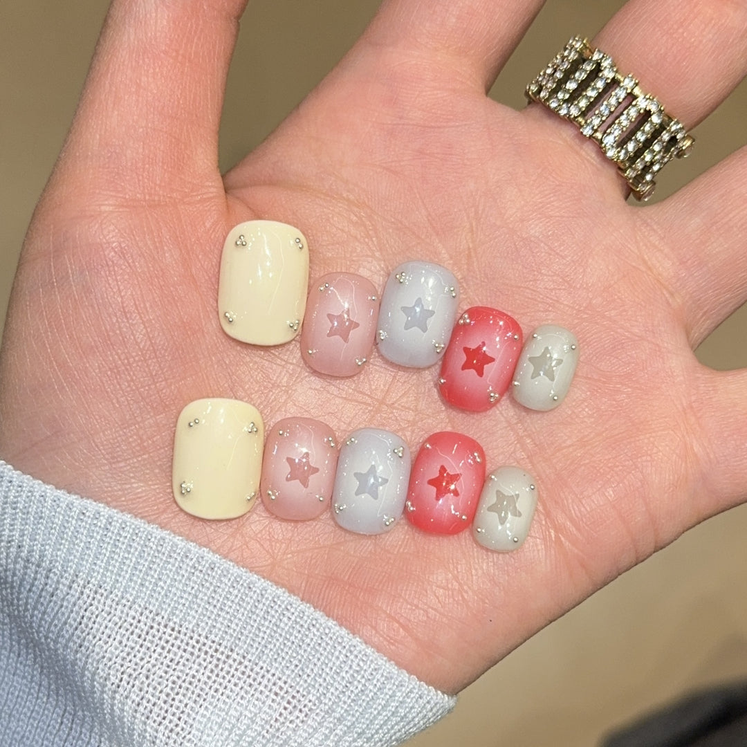 Artificial nails with sparkling star motifs Stornfield