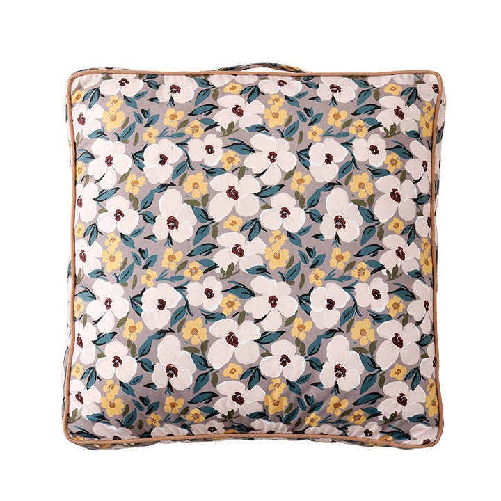 Large decorative seat and floor cushion with floral pattern