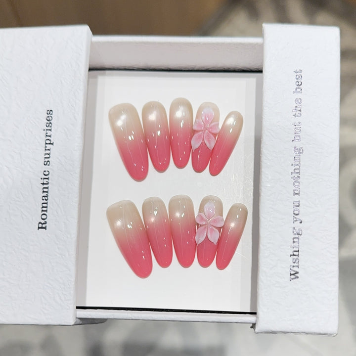 Artificial nails with romantic ombre design and floral accents Stornfield