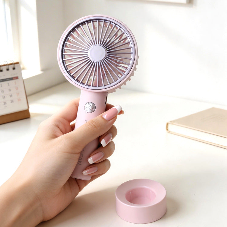 Ladies portable hand fan with variable speed control and ergonomic design Stornfield