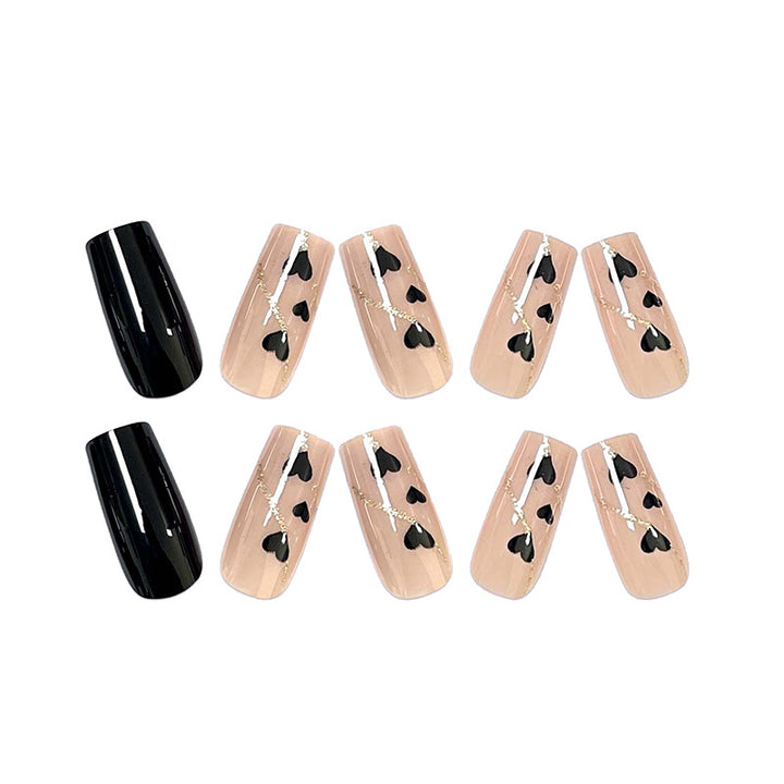 Artistic acrylic nails with heart design and glitter accents Stornfield