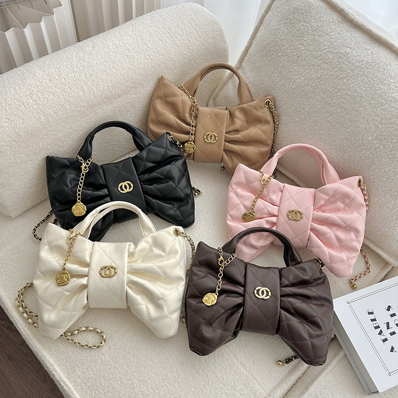 Quilted Bow Accent Handbag