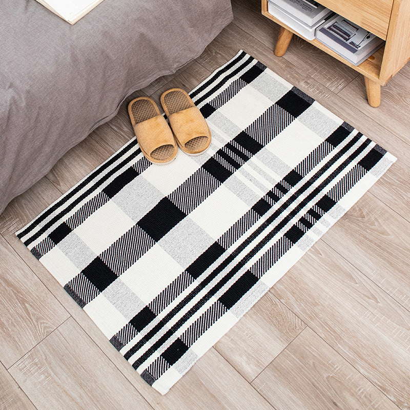 Woven cotton blend bath mat in buffalo check with flat weave structure Stornfield