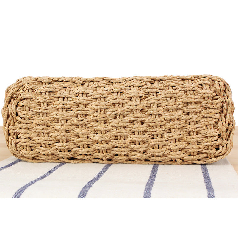 Handbag made of hand-woven natural material with pearl decoration Stornfield