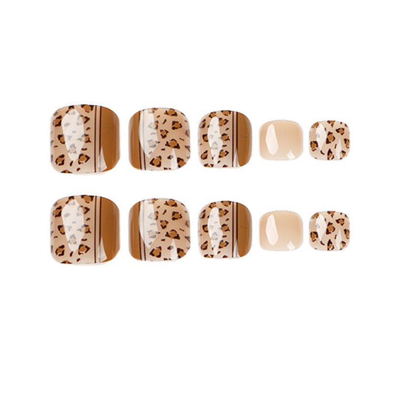 Artful toenail design with leopard pattern and modern lines Stornfield