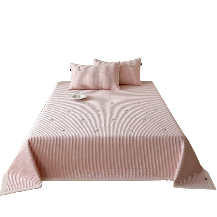 Padded fitted sheet set with vertical quilting and subtle floral embroidery
