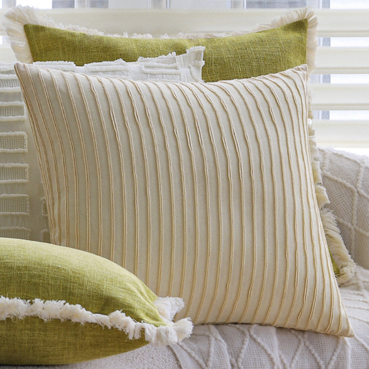 Square decorative pillow cover made of cotton blend with relief rectangular tufts and fringed edge Stornfield