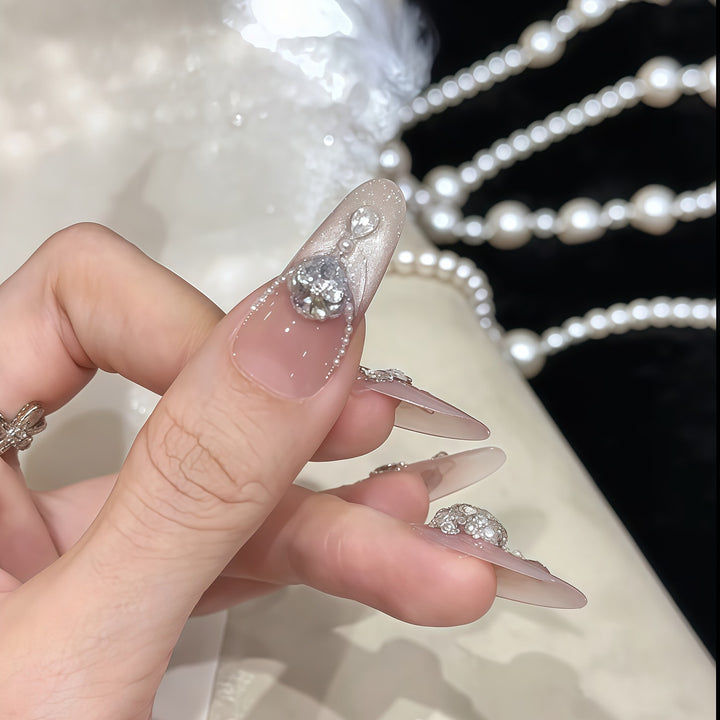 Glamorous artificial nail tips with rhinestone accents Stornfield