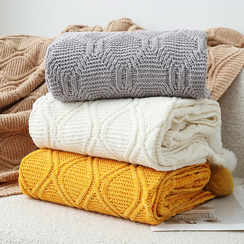 Ladies knit blanket with decorative pom poms Stornfield