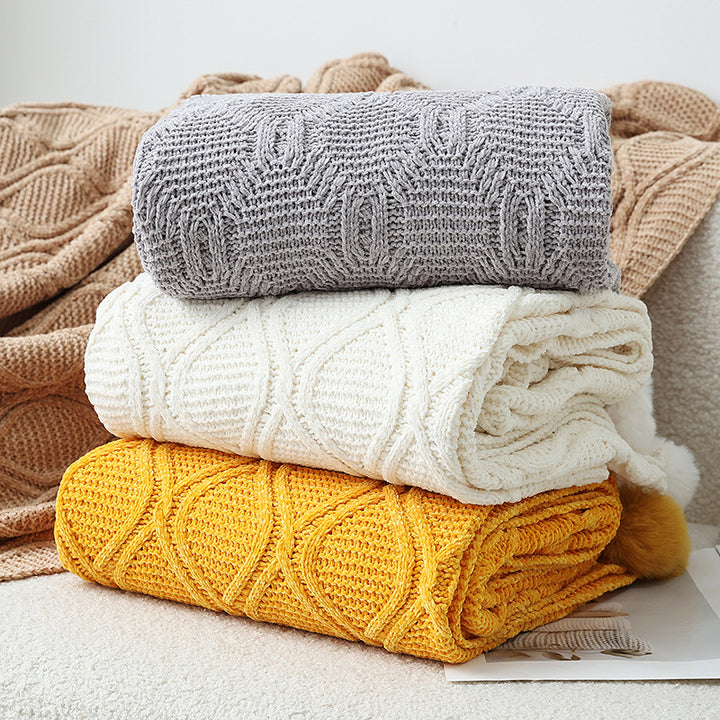 Ladies knit blanket with decorative pom poms Stornfield