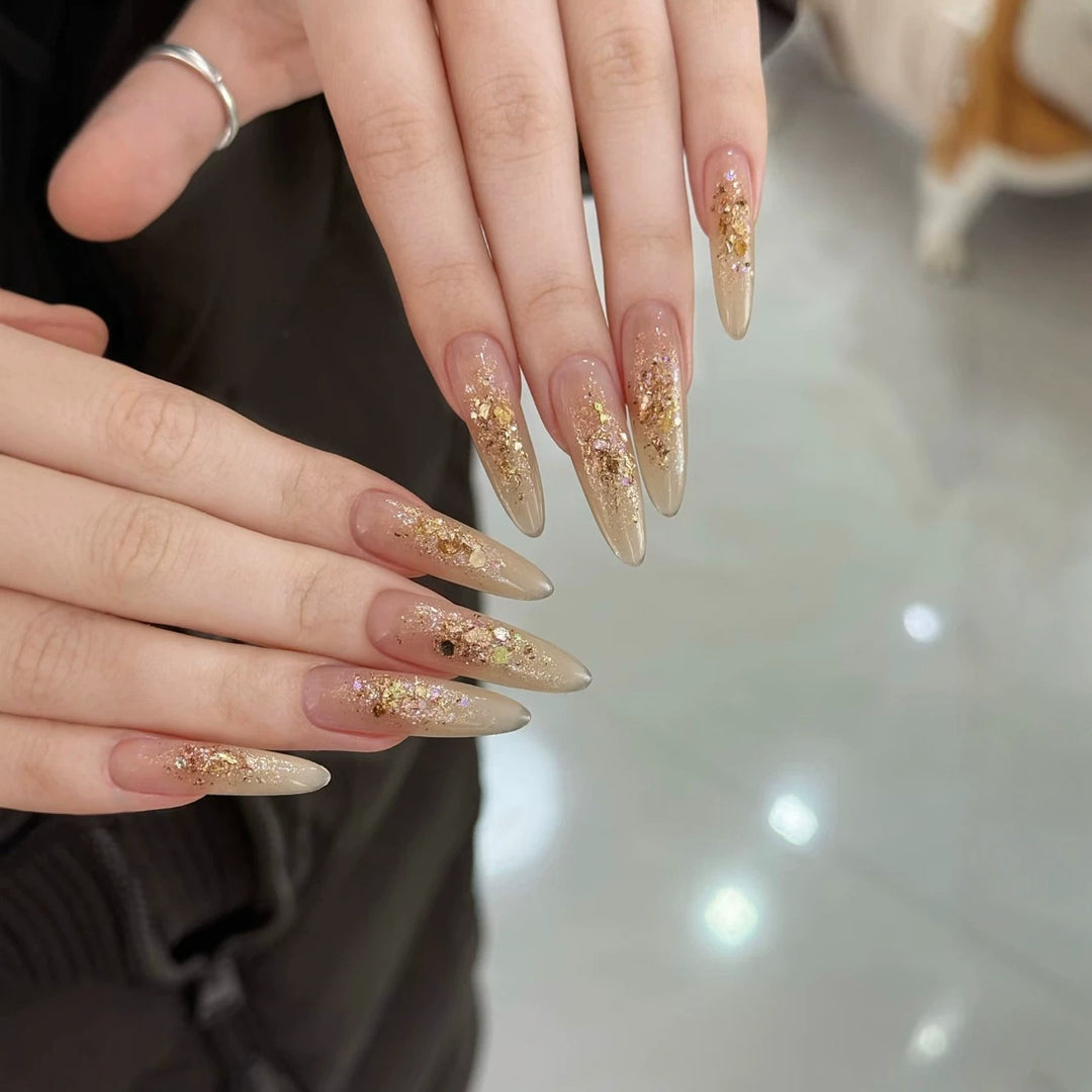 Elegant Stiletto Nail Extensions with Glitter Accents