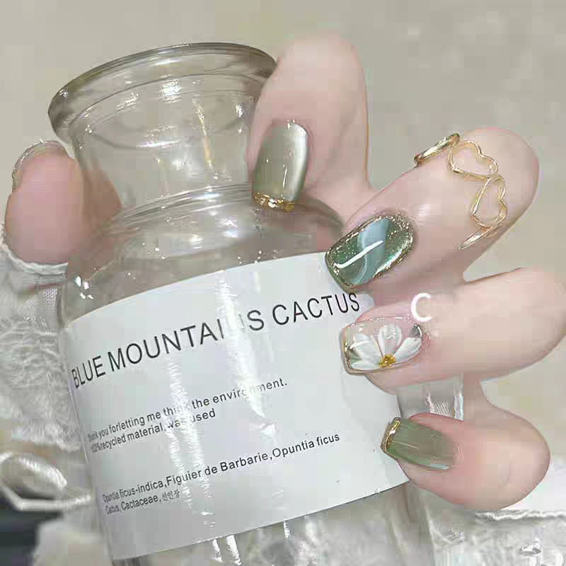 Elegant Stiletto Press-On Nails with Floral Embellishments Stornfield