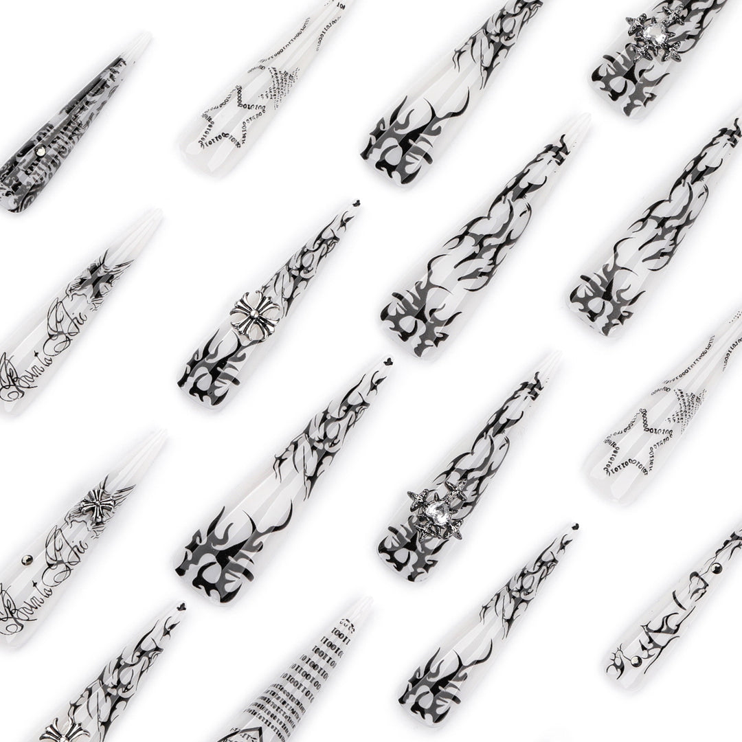 Artful stiletto nails with gothic pattern and embellishments Stornfield