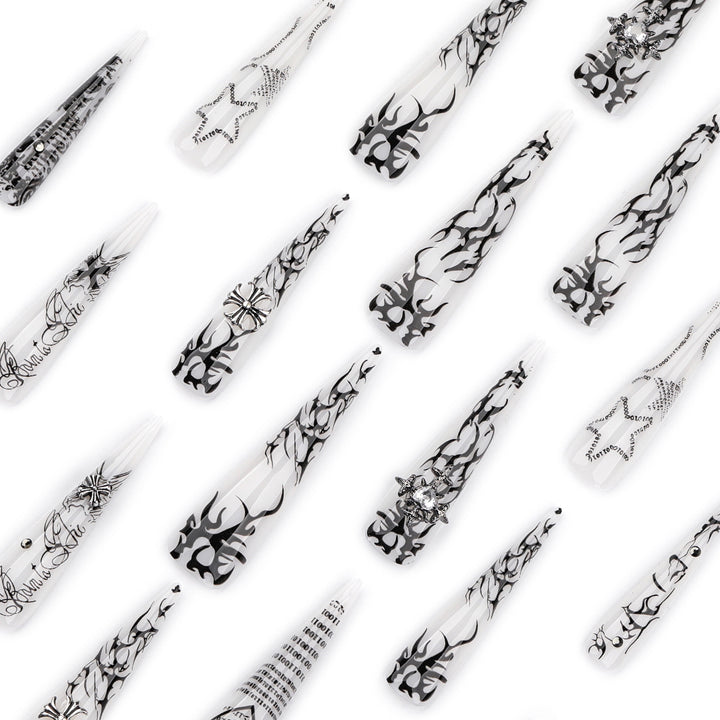 Artful stiletto nails with gothic pattern and embellishments Stornfield