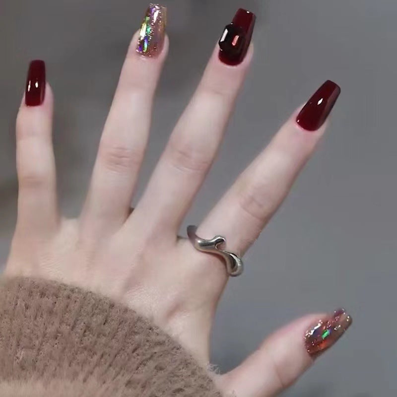 Glamorous artificial nails with crystal elements Stornfield