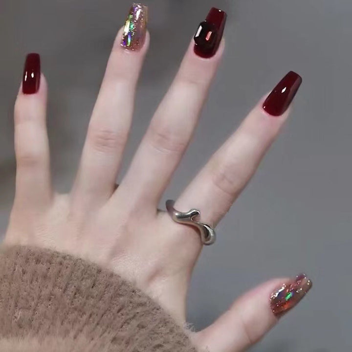 Glamorous artificial nails with crystal elements Stornfield