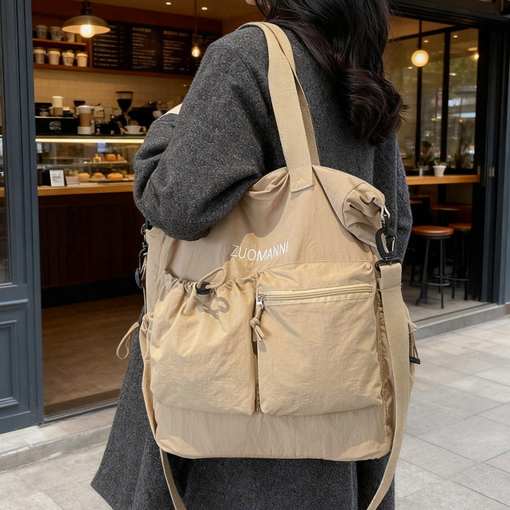 Tote bag with multifunctional outer pockets and adjustable shoulder strap Stornfield