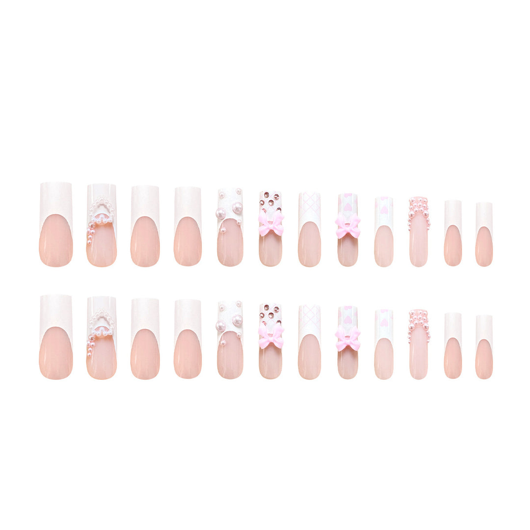 Artistic acrylic nails with bow and pearl decorations Stornfield