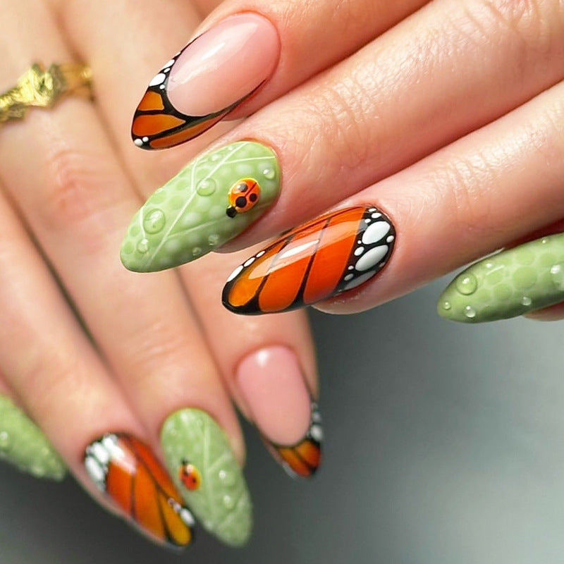 Artistic Press-On Nail Set with Butterfly and Floral Designs Stornfield