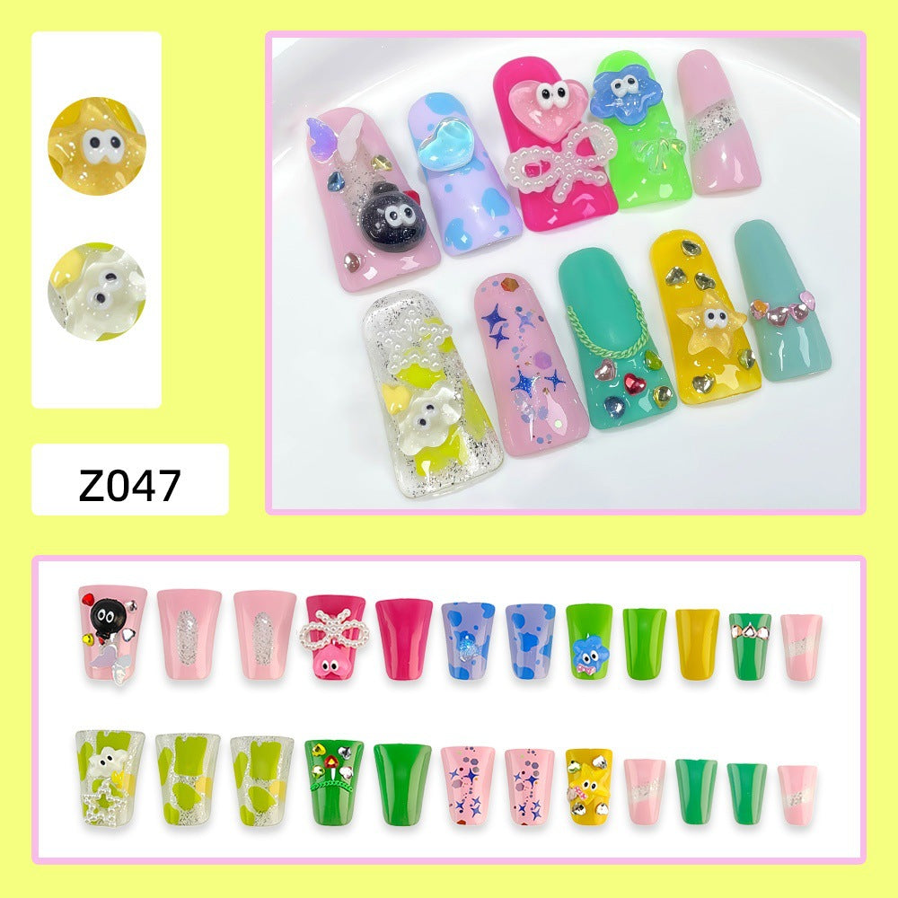 Creative press-on nails with playful 3D designs Stornfield