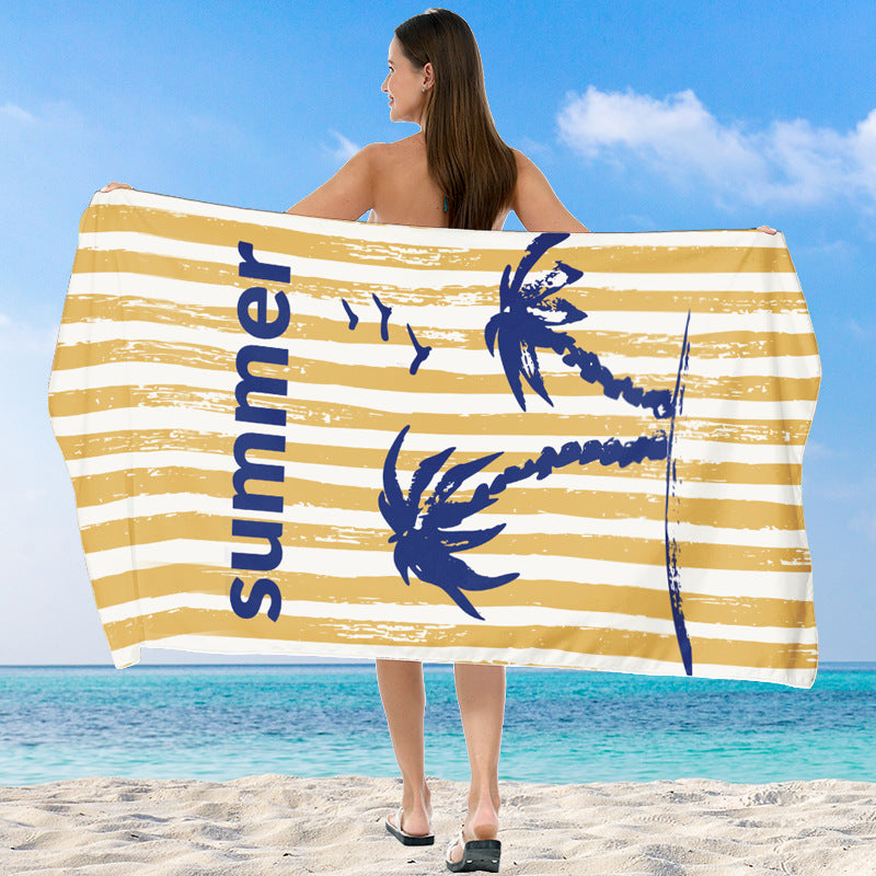 Beach towel with vibrant gradient color and stylish striped design Stornfield
