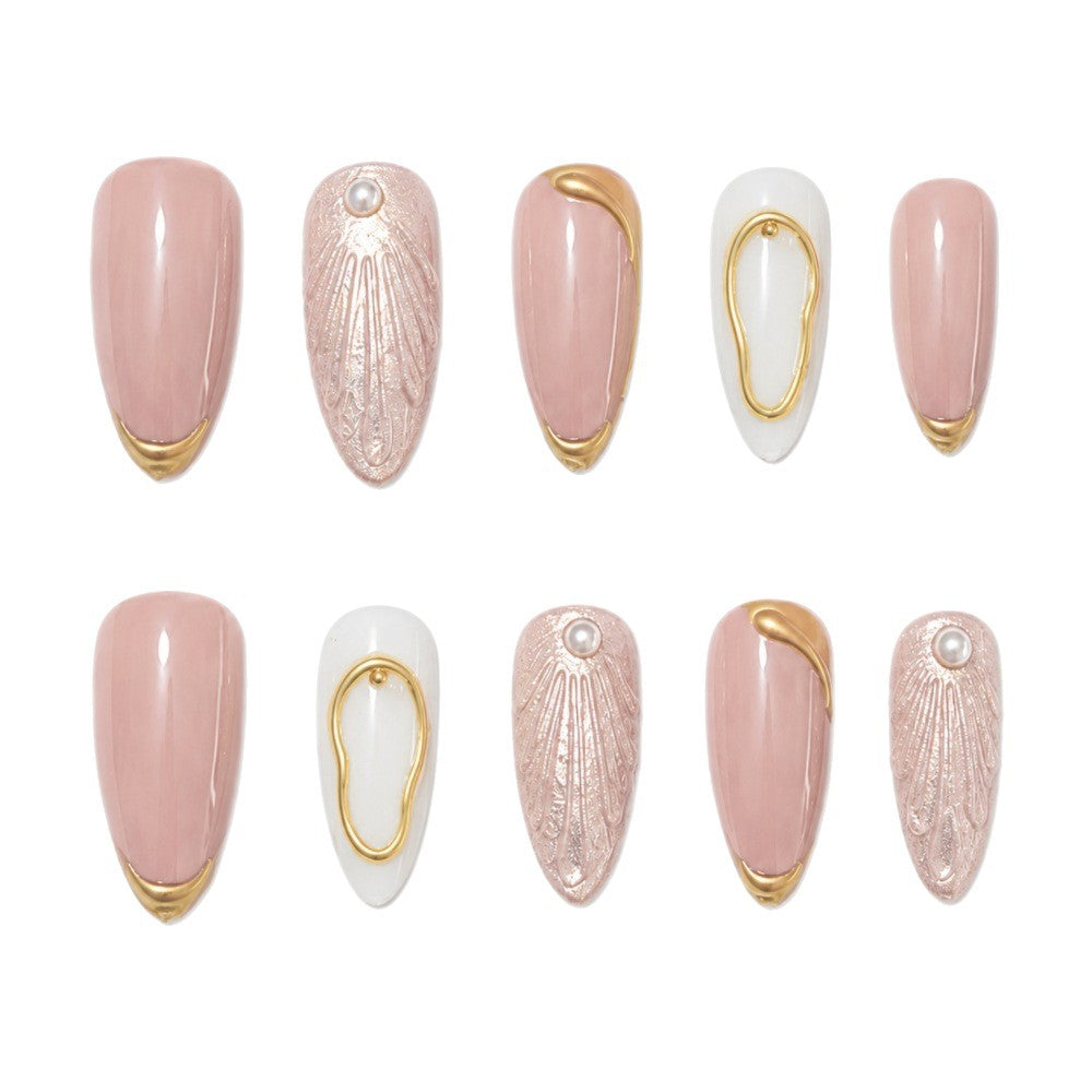 Artistic Press-On Nail Design with Gold Embellishments Stornfield