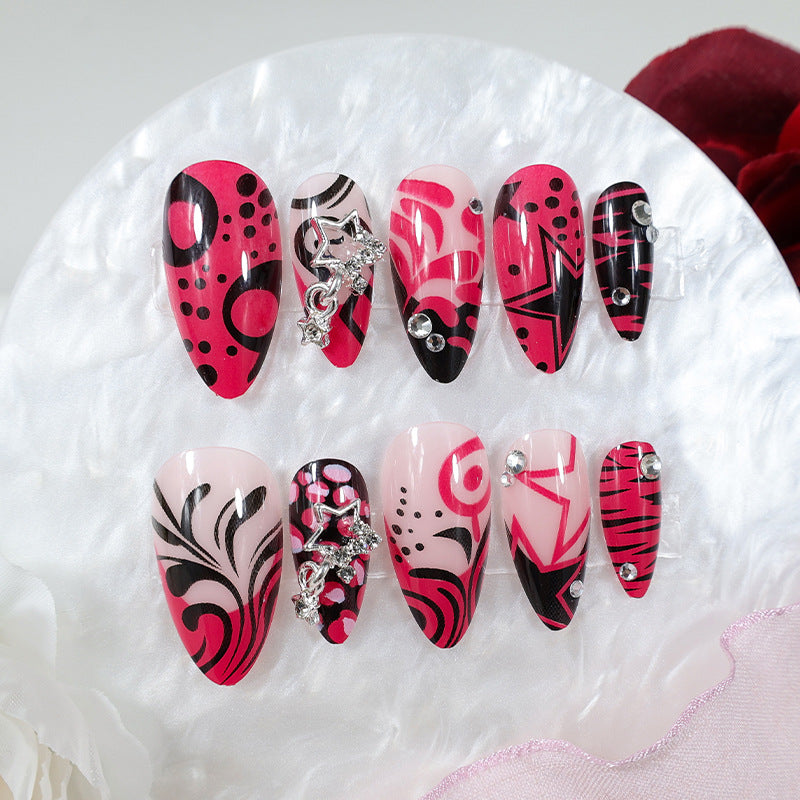Nail art set with playful patterns and rhinestone embellishments Stornfield