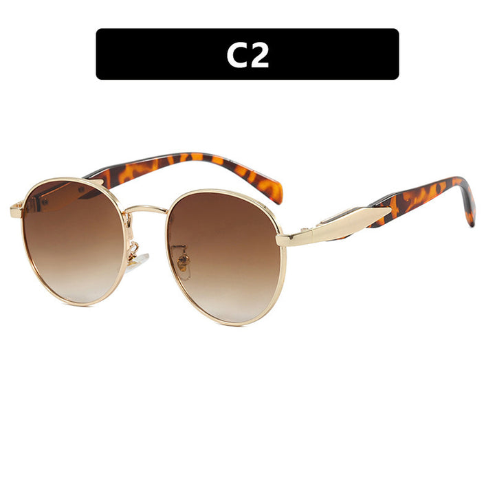Women's round sunglasses with elegant, golden frame and UV protection Stornfield