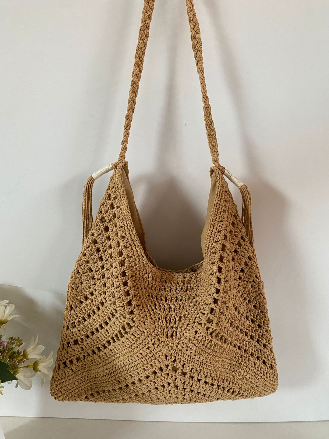 Hand-knotted shoulder bag with tassels and spacious interior Stornfield