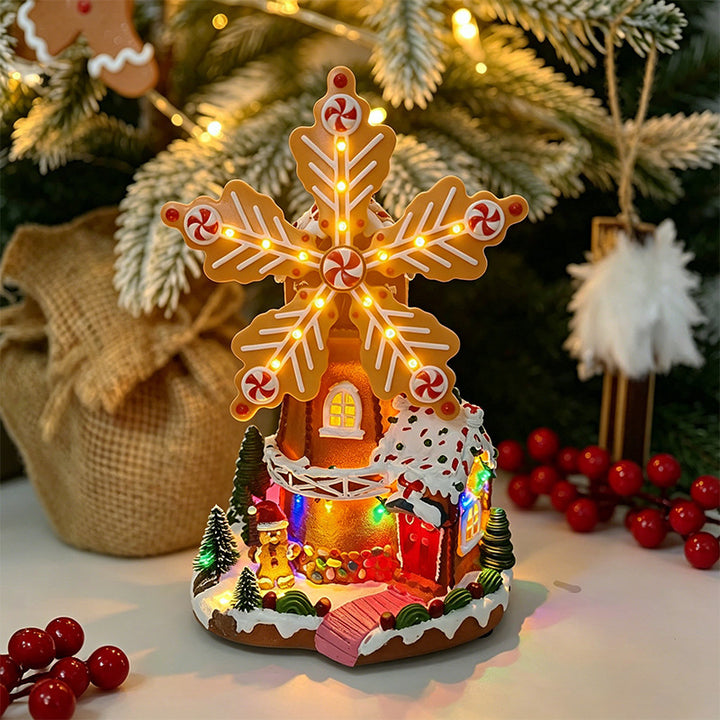 Illuminated Christmas village decoration with moving figures Stornfield