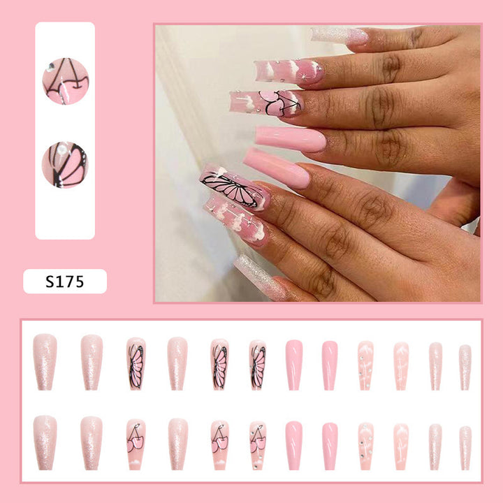 Artificial nail set with romantic butterfly designs and glitter accents Stornfield