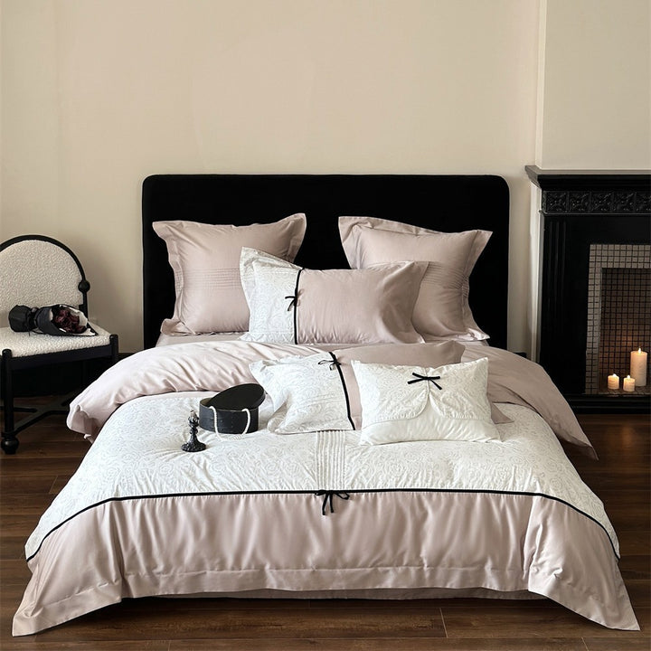 Reversible Duvet Cover Bedding Set with Quilted Jacquard Panel, Black Piped Trim & Decorative Bow Shams