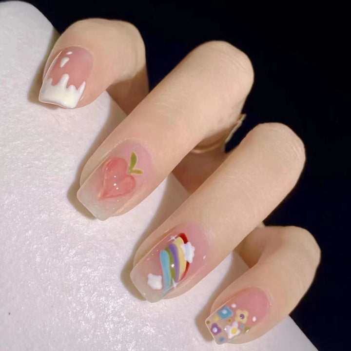 Creative nail art with fruit and flower motifs Stornfield