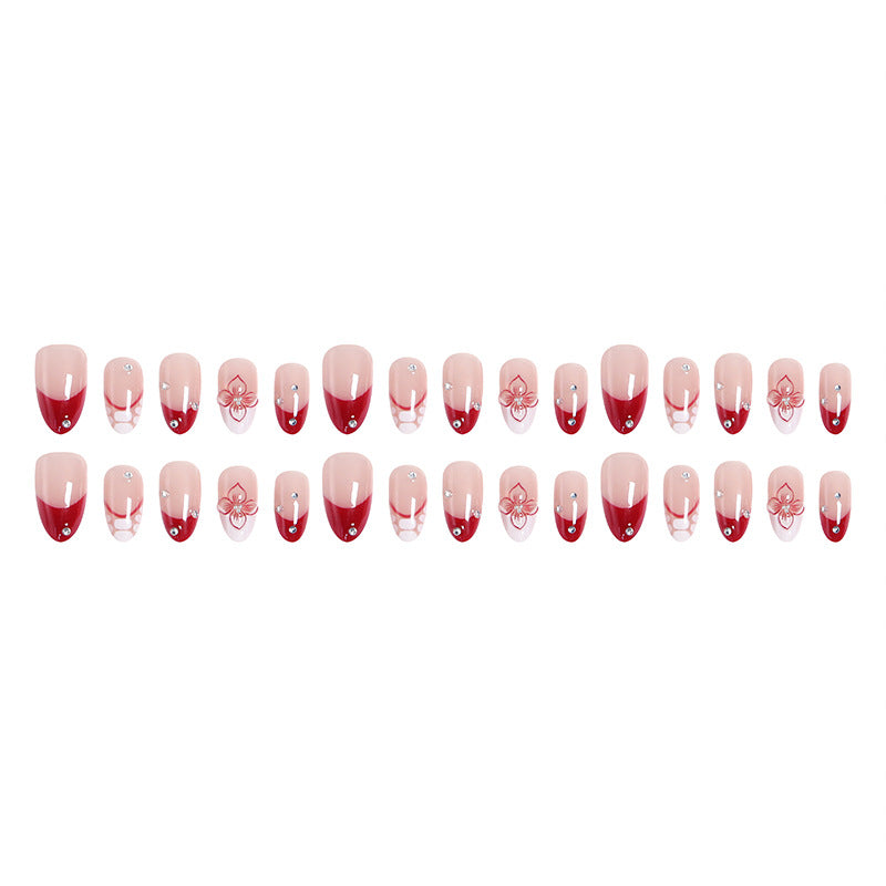 Artificial nails with floral and glittering accents Stornfield