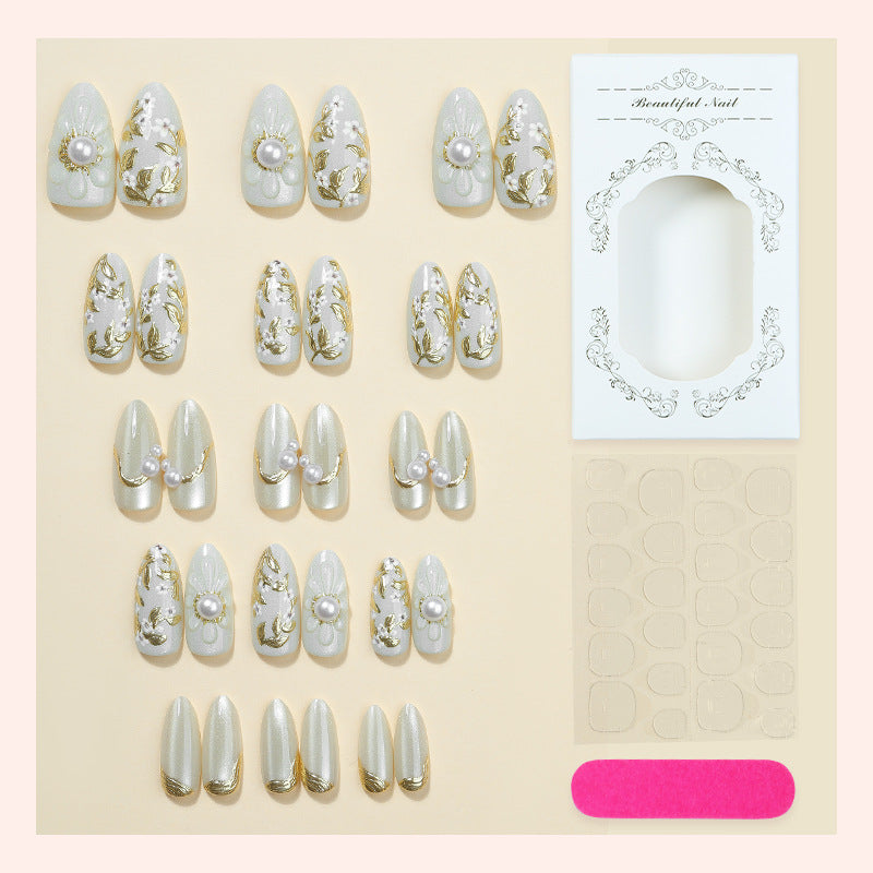 Artificial nail set with elegant flower and pearl decorations Stornfield
