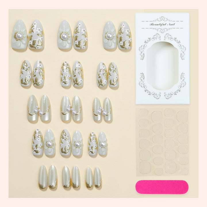 Artificial nail set with elegant flower and pearl decorations Stornfield