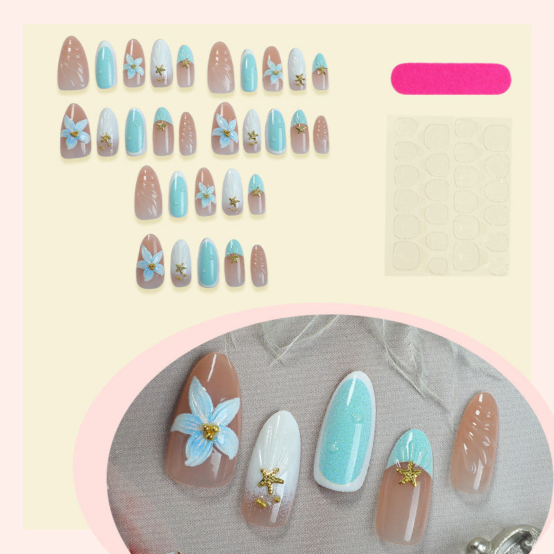 Artificial nail set with floral design and artistic embellishments Stornfield