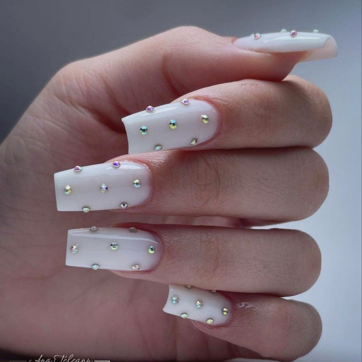 Acrylic nail set with elegant rhinestone decorations Stornfield