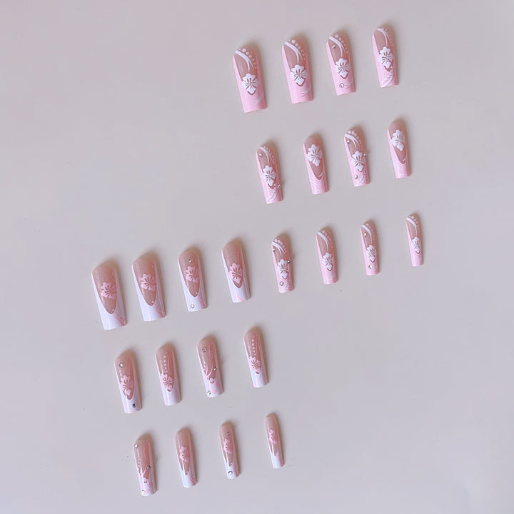 Art nail set with elegant flower design and crystal embellishments Stornfield