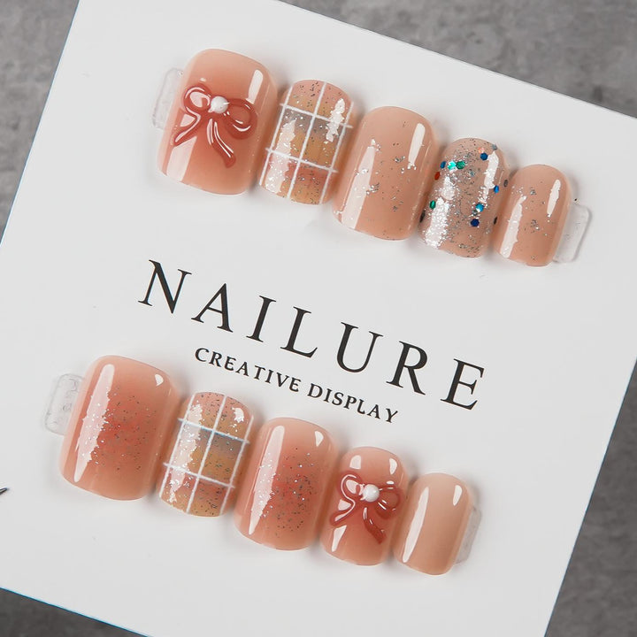 Artistic Press-On Nail Set with Decorative Bow Accents