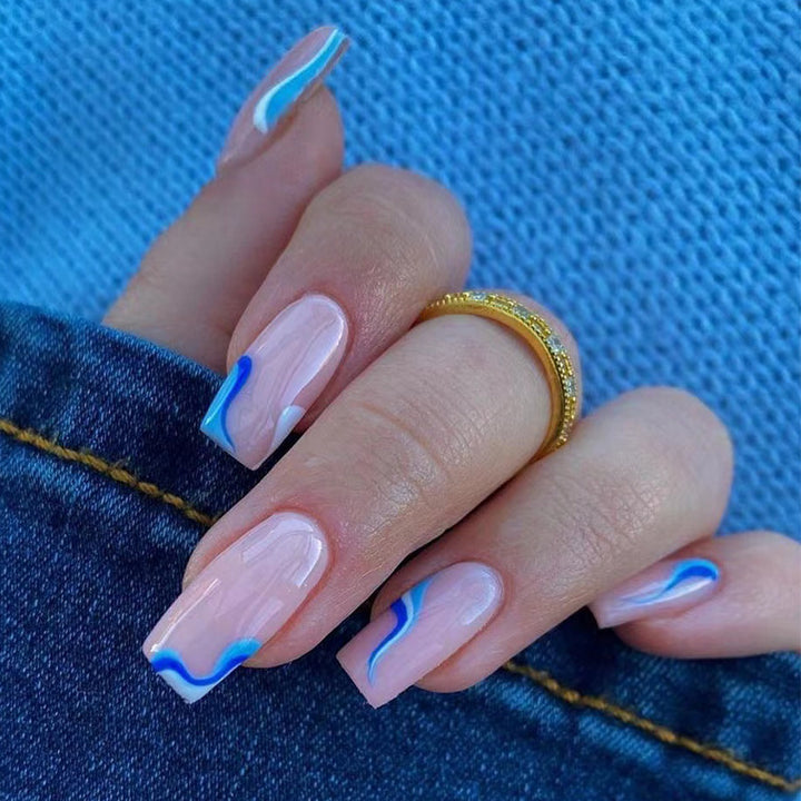 Artful nail extensions with maritime wave pattern Stornfield