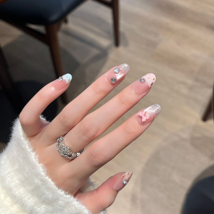 Decorative Press-On Nail Art with Bow and Gem Accents Stornfield